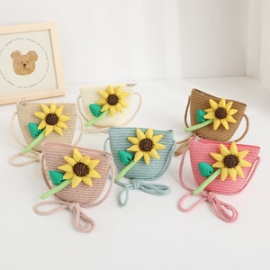 Detail view of woven sunflower crossbody bags for kids in six vibrant summer colors