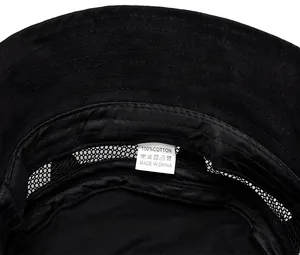 Detail of black cotton sun hat interior featuring breathable mesh and moisture-wicking sweatband
