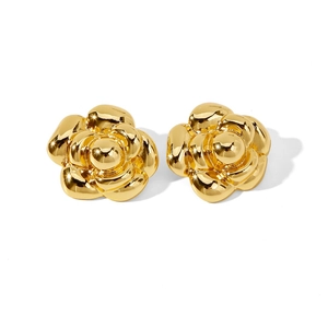 Polished golden camellia flower stud earrings with a glossy metallic mirror finish