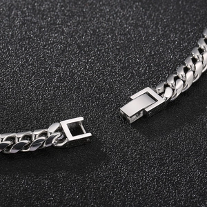 Brushed silver stainless steel Cuban link bracelet with professional folding clasp detail