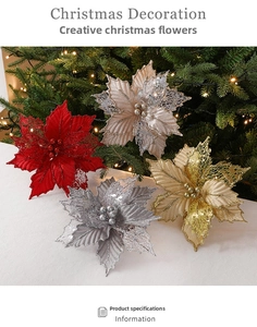 Close-up of sparkling glitter artificial poinsettia flowers for Christmas tree decor