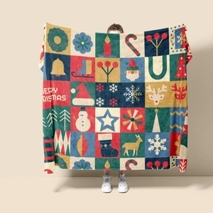 Detailed Christmas flannel blanket with festive patchwork patterns of snowmen and reindeer