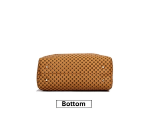 Detail view of the handbag base with four protective gold metal feet for wear resistance