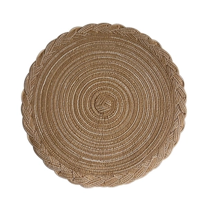 Circular woven jute place mat with spiral texture and scalloped edges on white background