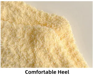Close-up of comfortable thick cream pink coral fleece heel detail for thermal socks