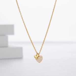 S925 sterling silver necklace featuring interlocking gold heart pendants with crystals