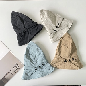 Nylon sun hats in four colors with button detail strap on clean white background