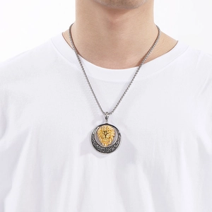 Lion head pendant necklace in silver and gold tone on a stainless steel bead chain