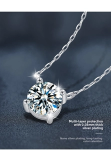 Macro detail of S925 silver moissanite pendant with four-prong setting and thick plating