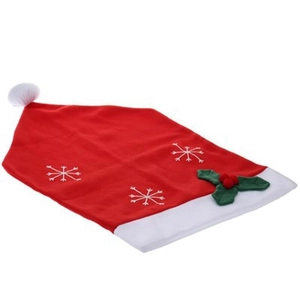 Red Christmas chair cover with white snowflakes and holly leaves on white background