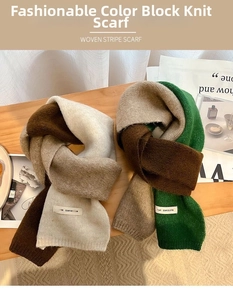 Close-up of knit texture on earthy tone color-block winter scarves with woven labels