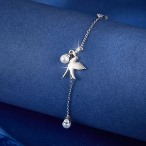 Exquisite S925 sterling silver bird bracelet with sparkling cubic zirconia and white pearls