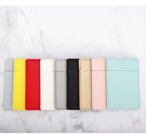 Litchi texture PU leather phone card holders in nine vibrant colors on marble background