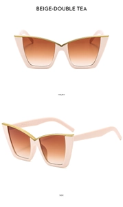 Detail view of beige cat-eye sunglasses with gradient tea lenses and metal frame accents