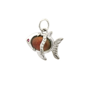 Macro shot of gold-plated fish pendant featuring amber crystal and sparkling zircon details