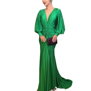 Elegant emerald green V-neck satin maxi dress with lantern sleeves and pleated fishtail hem