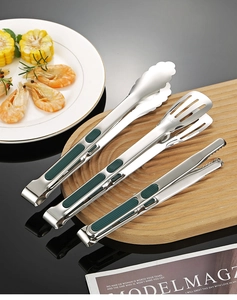 Close-up of the food-grade SUS304 engraving on three green-handle stainless steel kitchen tongs