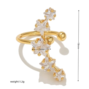 Detail of 18k gold ear cuff featuring five graduated cubic zirconia stars in a sleek vertical row