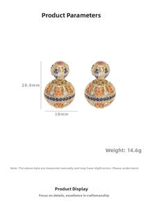 Detail view of hollow gold-plated sphere earrings with colorful zircons and size specifications