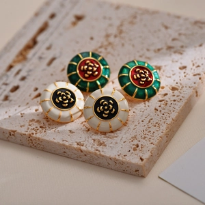 Vintage enamel camellia earrings with gold plating and floral design on stone base