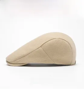 Close-up of beige wool blend beret hat showing high-quality twill texture and stitching
