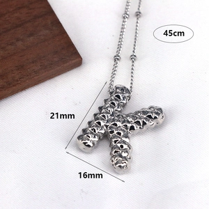 Polished silver letter K pendant necklace with 45cm chain length measurement details