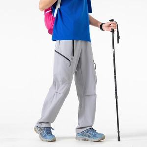 Light gray men's tactical cargo pants with zipper pockets and adjustable drawstring hem