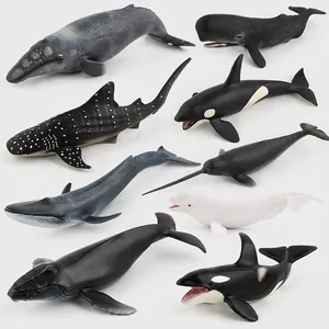 Realistic marine animal toy set including orca, narwhal and shark models on white background