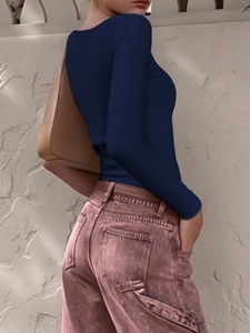 Slim fit dark navy blue long sleeve Y2K top styled with studded pinkish brown jeans