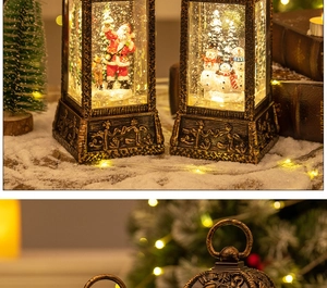 Detail of vintage bronze Christmas lanterns with Santa and snowman scenes inside