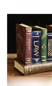 Macro detail of hand-painted vintage book resin ornaments with antique gold patterns