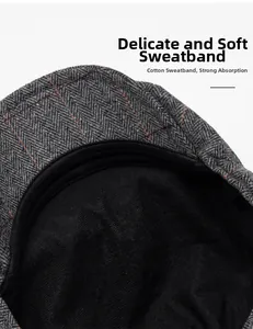 Detail view of the soft cotton sweatband and inner lining on a herringbone flat cap
