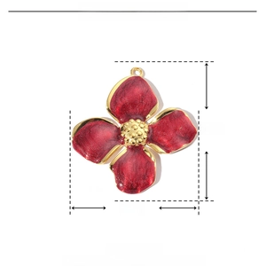 Detailed specs of flower charm in red enamel and gold stainless steel finish