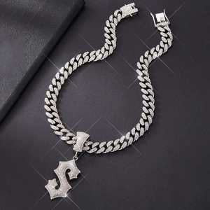 Hip hop silver Cuban chain necklace featuring a sparkling iced-out dollar sign pendant