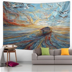 Abstract mandala tapestry featuring ocean waves and sunset above a modern gray sofa
