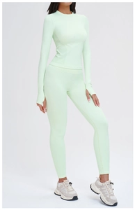 Detail of light green seamless yoga set with thumb holes and high waist leggings