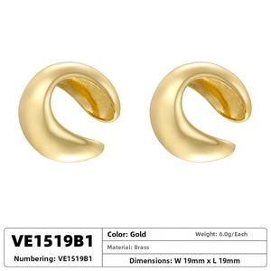 Detailed technical view of gold daisy C-shape earrings with brass material specs