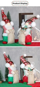 Detail von Weihnachts-Wichteln mit Schneeflockenmütze und Jute-Geschenkbeutel