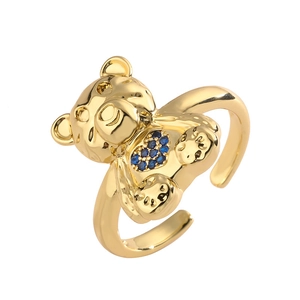 Adjustable golden bear ring featuring a blue zircon heart on minimalist metal