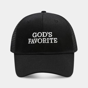 Close-up of black mesh trucker hat featuring white GOD'S FAVORITE letter embroidery
