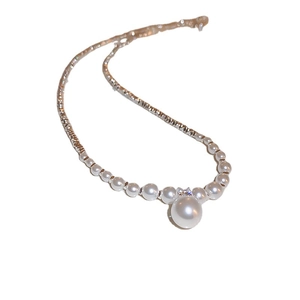 Elegant pearl necklace featuring a large centerpiece pearl and zircon accents for women