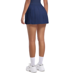 Rear view of high-waisted navy pleated tennis skirt with uniform folds and athletic fit