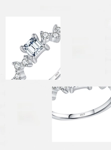 Detailed macro view of S925 sterling silver stamp and emerald-cut cubic zirconia ring