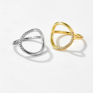 Minimalist circular hollow rings in gold and silver finish with small diamond accents