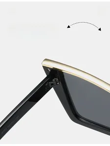 Detailed close-up of durable metal hinges and M493 model marking on cat-eye sunglasses
