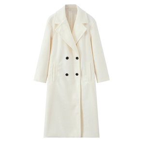 Close-up of cream white wool coat with notched lapels and contrasting black double-breasted buttons