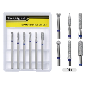 Macro detail of 6pcs diamond nail drill bit set with emery coating and storage box