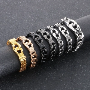 Close-up of retro cuban links in gold, rose gold, black, and silver stainless steel
