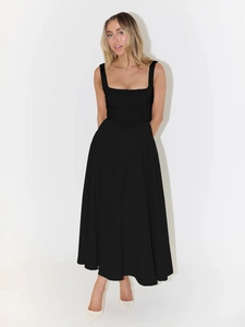 Detail view of the French style long black dress with square neckline and V-shaped waistline