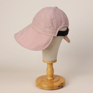 Detail of pink wide brim nylon sun hat showing water-repellent quick-dry fabric texture